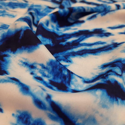 blue and white tie dye on soft, breathable, likre fabric for summer clothing and beachwear