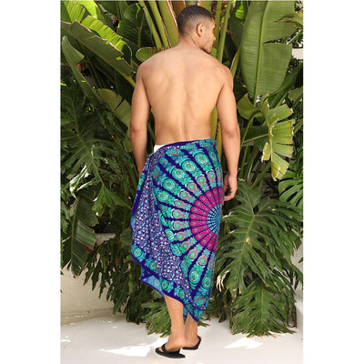 man facing backwards with beautfiul mandala sarong wrapped around his waist